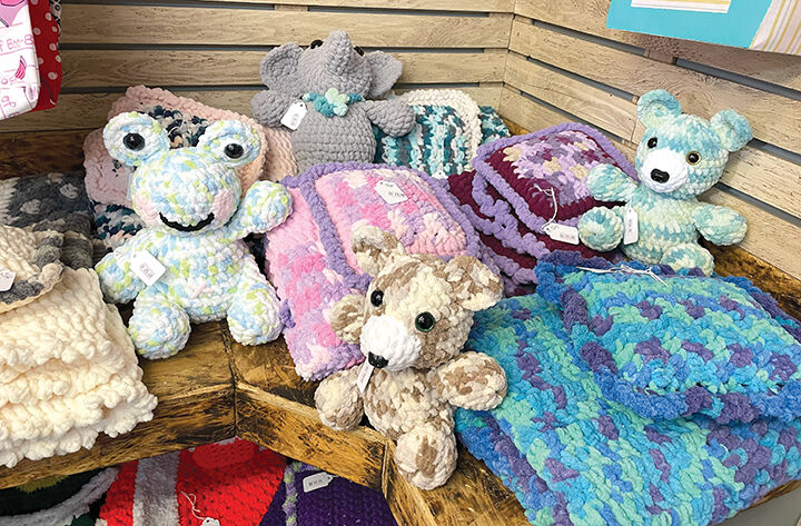 Stuffies and blankets are part of the baby corner in R&R Gifts and More.
